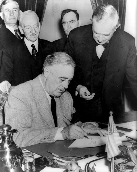 Franklin Delano Roosevelt signing the declaration of war against Germany on December 11, 1941. Three days earlier he had done the same against Japan. (Image: Wikipedia)