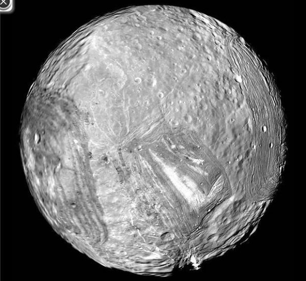 Uranus' icy moon Miranda is seen in this image from NASA's Voyager 2 probe on Jan. 24, 1986. Credit: NASA/JPL-Caltech