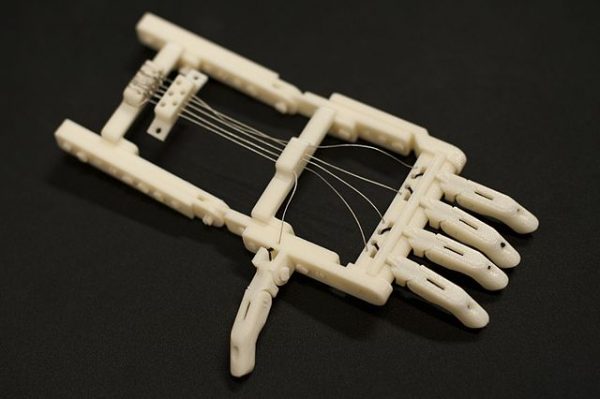 The Snap-Together RoboHand prosthetic was invented by South African carpenter Richard van As and made available for free on the Internet. Before printing, the hand can be individually sized, and all connecting pieces are also printed. The device can now be printed for less than $100. (Image: FDA via wikimedia / CC0 1.0)