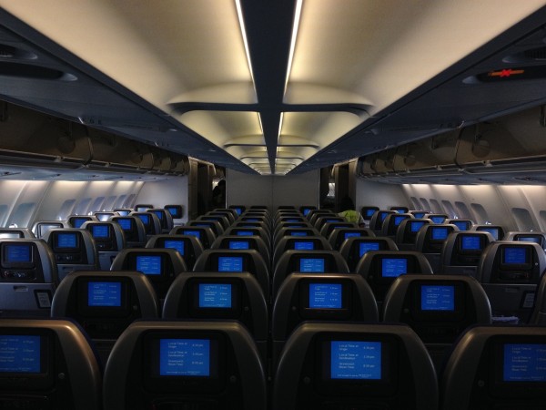 While on-demand touch screens were usually reserved just for first class passengers, their abundance on most major commercial flights has made it more of a standard feature that flyers expect in all classes. (Image: pixabay / CC0 1.0)