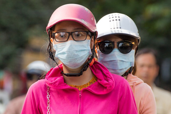 So if you find yourself suffering from the sniffles, perhaps you should do like the locals and put on a mask. (Image: via pixabay / CC0 1.0)