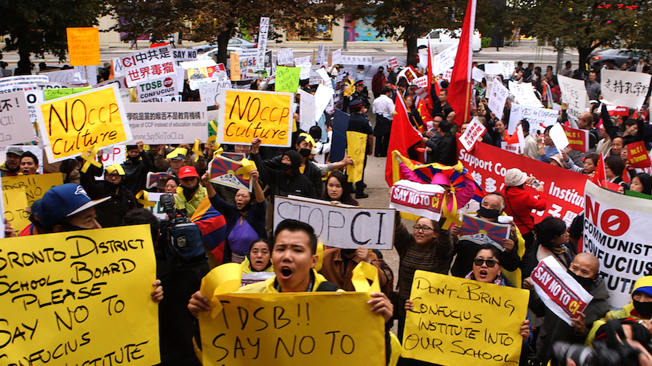 Confrontation between the pro- and anti- Confucius Institute demonstrators escalates at the Toronto District School Board. (Image via Films Website)