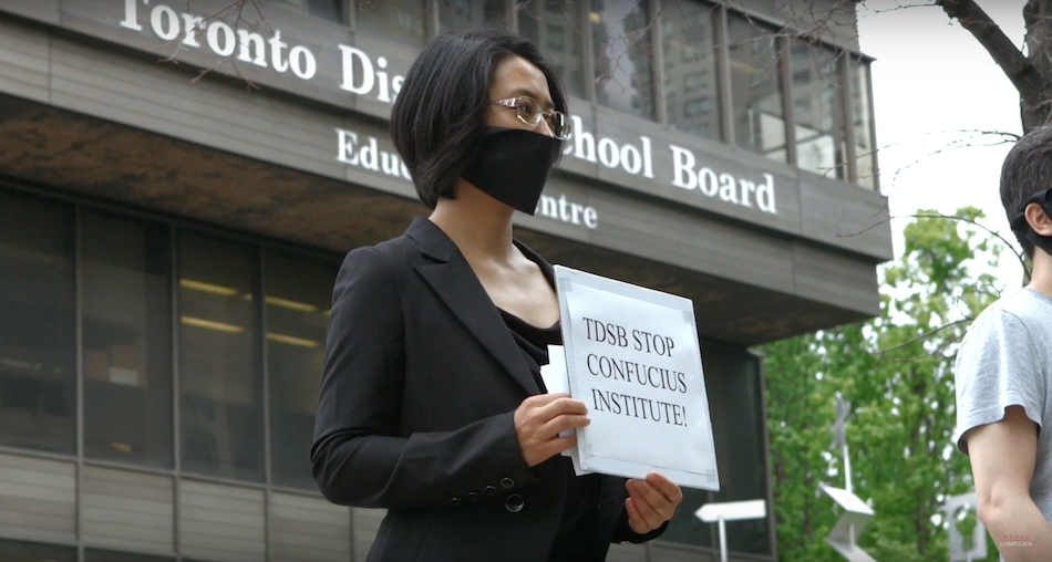 Former CI teacher Sonia Zhao protests the Confucius Institute at the Toronto District School Board. (Image via Films website)
