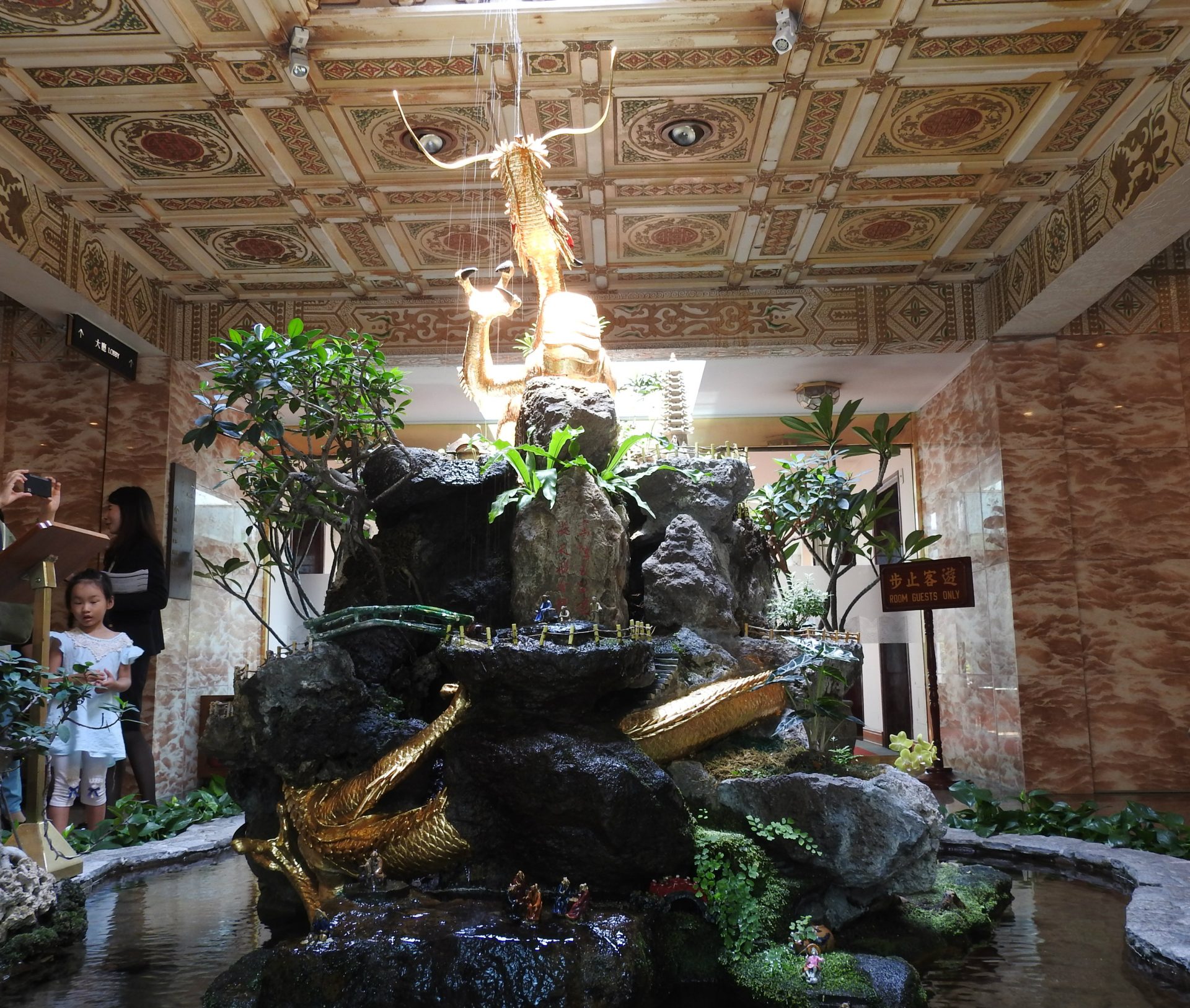 One of the highlights of the Grand Hotel is its century-old Golden Dragon made of bronze and gilded with 24K gold. (Image: Billy Shyu/ Vision Times)