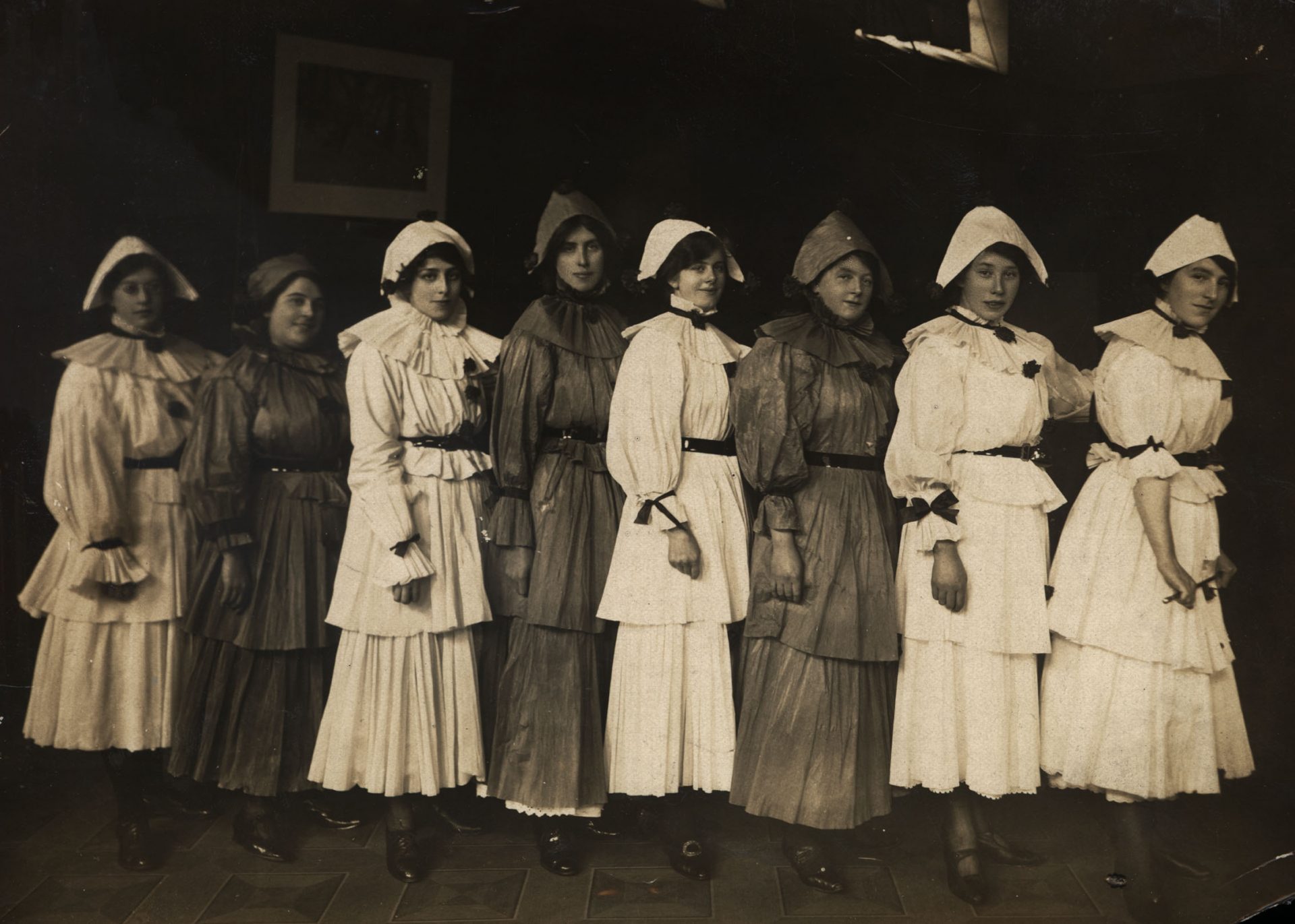 War Time Nurses entertain Wounded Soldiers This is a photograph of sisters and nurses dressed in costume for a Christmas performance at 3rd Northern General Hospital, Sheffield. The photograph was taken in December 1916 and offers a caring and humorous impression of the women working in the Hospital. Reference: DF.BGS-4-7-1 The photograph is part of a larger collection that shows a rare and intimate glimpse in to the Life of a Wounded Soldier recovering from the horrors of World War One. This particular set of photographs is taken from a collection held at Tyne & Wear Archives Information and photo from https://www.flickr.com/photos/twm_news/9490957061/in/photolist-fsFCSH-hz3gCY-4jzbzQ-q66ZrE-HWVZ6f-ptDpcA-bV8e4k-9WYHBp-69xVJT-ovx8G4-4jz73Q-22QBPsW-a5ZMA1-5qCF2q-CcM7V9-awxRsS-GoGWaQ-igKH3n-q1mdPm-4jv8L4-4jz9DE-ft4pso-4jyC7r-4jza33-CBAQRh-hwRfMy-p7dJhK-4G3xux-5BUsv9-4QjZUo-hxANRh-hwSDdH-a5JVno-23rDLyQ-GoGQrA-4jzbLL-9rVbQn-6ivpkL-4Qt4iD-qq17hN-bWHb7P-VGu6HZ-iRwZ9V-Fn6cXS-FgcRiP-htWNUY-qjCKby-C6ppBV-4orZRC-au3QkK