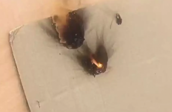 The video shows a man firing the ZKZM-500 across a rooftop at paper targets and T-shirts. The cameraman walks over to the targets, which are seen to have been burned and smoldering. (Image: YouTube/Screenshot)