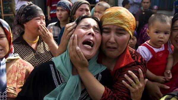 As many as one million members of the Muslim Uyghur minority have been sent to rapidly constructed concentration camps to perform forced labor and receive atheist “re-education” (Image: YouTube/Screenshot)