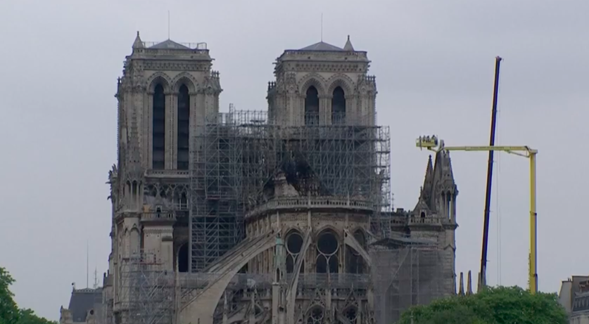 Notre Dame’s medieval masonry remained intact, shielding much of the lower interior from further damage. (Image: YouTube/Screenshot)
