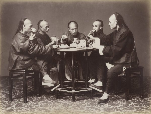 Chinese males having a meal.