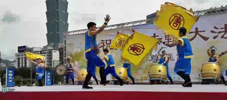 NTD Taiwan Flag and Drum Team performs at World Falun Dafa Day in Taipei.