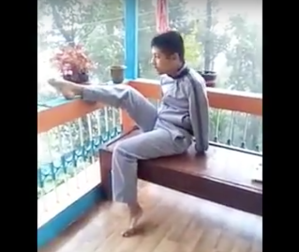 In India, Bikram Bhattarai who was born without hands, is evoking feelings of awe in the media. (Image: YouTube/Screenshot)