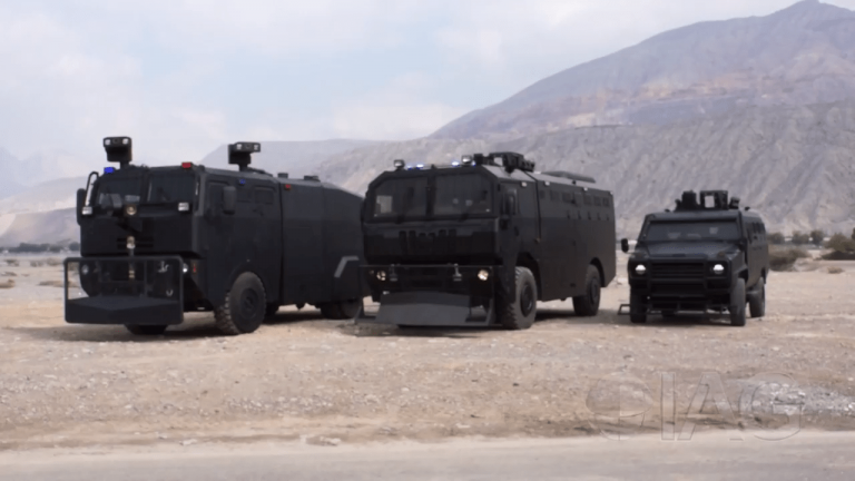 Custom equipment aimed at crushing urban violence, including trucks used to lay down barbed wire barricades and water cannon vehicles, have been moved near the border.