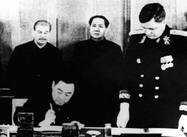 Mao and Stalin signing a friendship treaty between China and the Soviet Union on Feb. 14, 1950. In the early days of communist China, many looked towards Moscow as the future of development in all regards. (Public Domain)