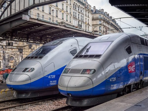 TGVs at the Gare de l'Est in Paris. Operated by the state-owned SNCF, it holds the world record for the fastest wheeled train, reaching 574.8 km/h (357.2 mph) during tests in 2007. (Image: Ermell via wikimedia CC BY-SA 4.0)
