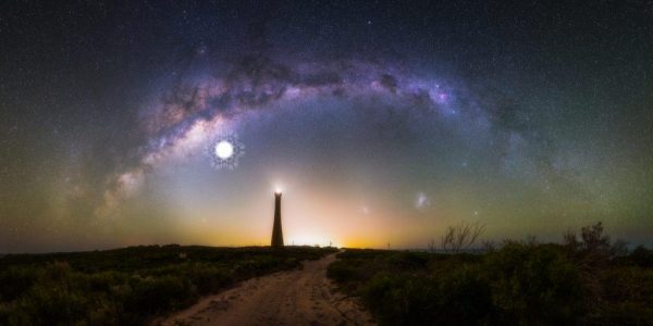 This 28 image photomosaic captures the arch of the milky way over the Guilderton Lighthouse in Western Australia, and the Large and Small Magellanic Clouds. The location of a supernova that would have exploded 9,000 years ago and been visible in the night sky is shown in the image. (Image: Paean Ng / Astrordinary Imaging)