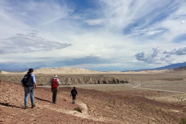 Researchers Ganqing Jiang, Malcolm Wallace and Alice Shuster head off into the desert in search of iron formations (Death Valley, California). (Image: Maxwell Lechte)