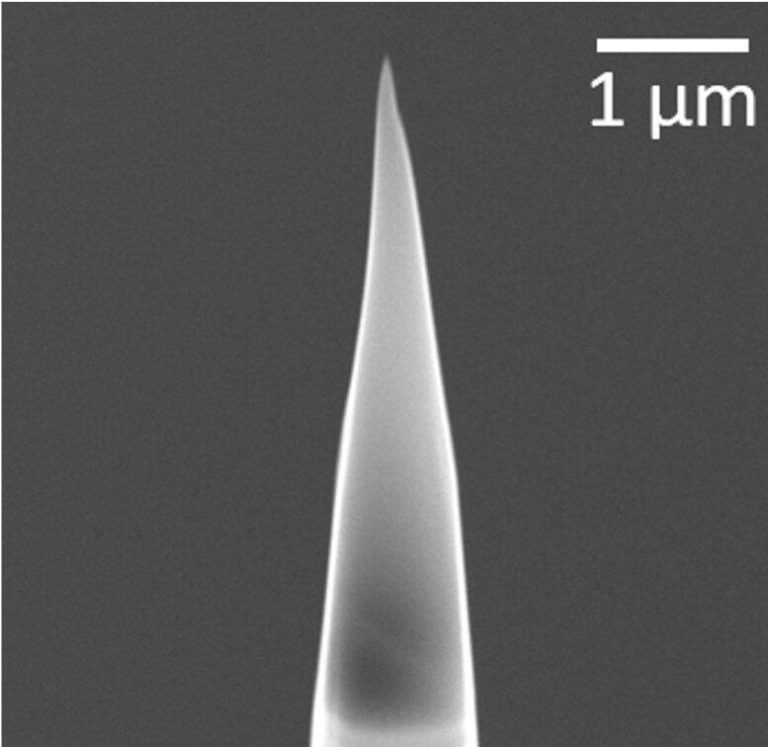 A tiny, sharped piece of a grain of moon dust, only a few hundred atoms wide.