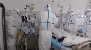 A doctor treating a coronavirus patient.