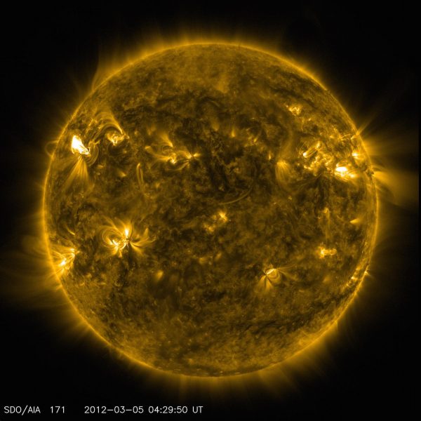 An image of active regions on the Sun from NASA’s Solar Dynamics Observatory. The glowing hot gas traces out the twists and loops of the Sun’s magnetic field lines. (Image: NASA/SDO/AIA)