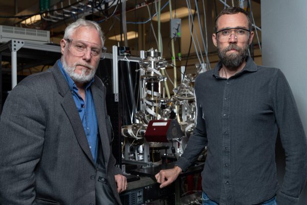 Scientists model a feasible chemical reaction, in which the Vulcan heat on Mercury could help it make ice at its poles: Georgia Tech’s Thom Orlando (left) is the new Mercury study’s principal investigator. Brant Jones (right) is first author. The two are also engineering the same chemistry in the lab to propose it as a method of making water for missions to the moon and to Mars. Orlando co-founded the Georgia Tech Center for Space Technology and Research. (Image Georgia Tech / Rob Felt)
