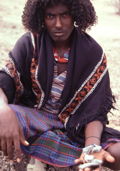 The late Ibrahim Habib, an Afar colleague,showing fragments of the DAN5 cranium. (Image: Dr. Jay Quade, University of Arizona)
