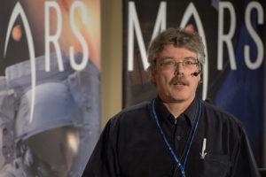 Dirk Schulze-Makuch, Technical University Berlin/Washington State University, speaks during the First Landing Site/Exploration Zone Workshop for Human Missions to the Surface of Mars held at the Lunar and Planetary Institute, Wednesday, Oct. 28, 2015, in Houston, Texas. The agency is hosting the workshop to collect proposals for locations on Mars that would be of high scientific research value while also providing natural resources to enable human explorers to land, live and work safely on the Red Planet. Photo Credit: (NASA/Bill Ingalls)