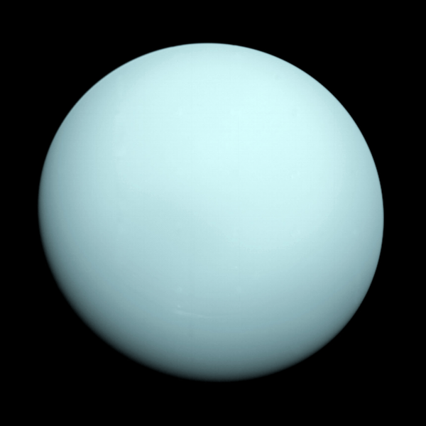 Voyager 2 took this image as it approached the planet Uranus on Jan. 14, 1986. The planet’s hazy bluish color is due to the methane in its atmosphere, which absorbs red wavelengths of light. (Image: NASA/JPL-Caltech)