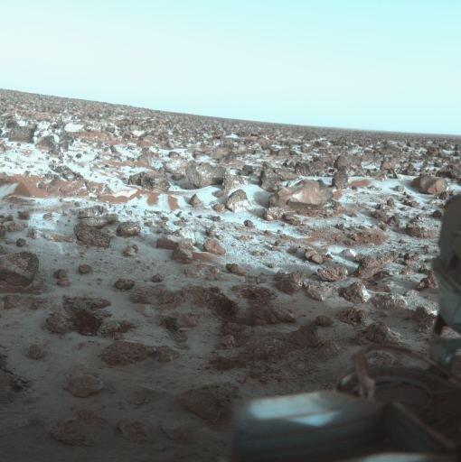 NASA’s Viking Lander landed at Utopia Planitia in 1979 and snapped this image of frost-covered soil and rocks. China’s Tianwen lander will also land at Utopia Planitia. Image Credit: By “Roel van der Hoorn (Van der Hoorn)” – Own work based on images in the NASA Viking image archiveSee accurate colors at: PIA00571: Ice on Mars Utopia Planitia Again, (Image: CCO1.0)