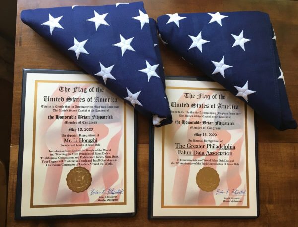 Certifications of the two American flags flown over the U.S. Capitol in honor of World Falun Dafa Day on May 13, 2020. (Image: Courtesy of Jennie Sheeks/via The Epoch Times)