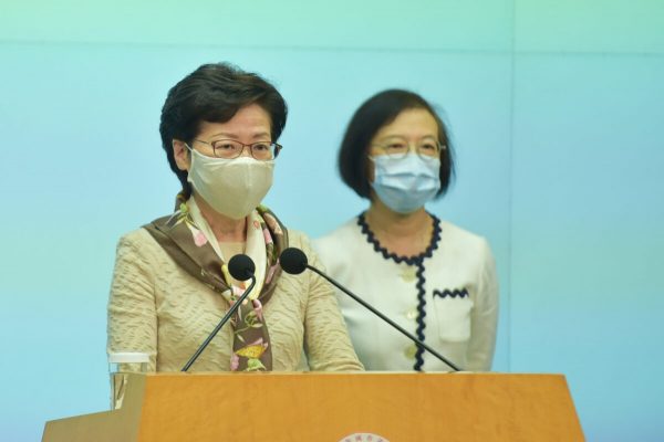 Hong Kong leader Carrie Lam (front) holds her weekly press conference in Hong Kong on June 2, 2020. (Bill Cox/The Epoch Times)