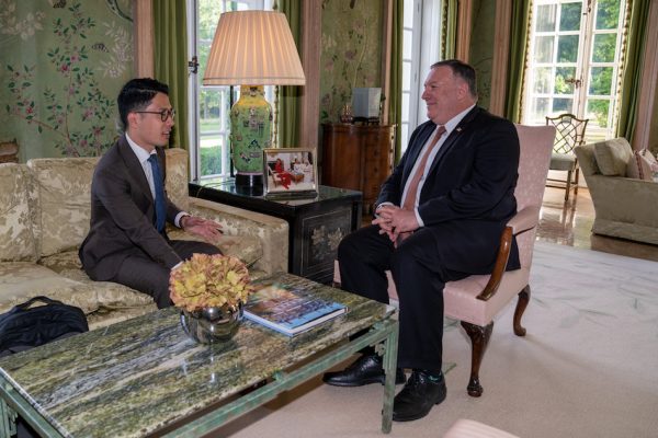 Secretary of State Michael R. Pompeo talks with Hong Kong Democracy leader Nathan Law, in London, United Kingdom, on July 21, 2020. (Image: Ronny Przysucha/U.S. State Department/ Public Domain)