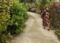 Indian woman walking through the village.