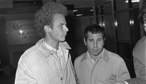 Art Garfunkel (left) and Paul Simon (right).