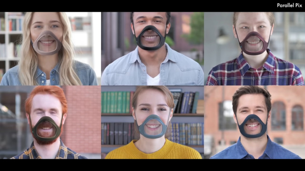 Men and women modeling a transparent face mask.