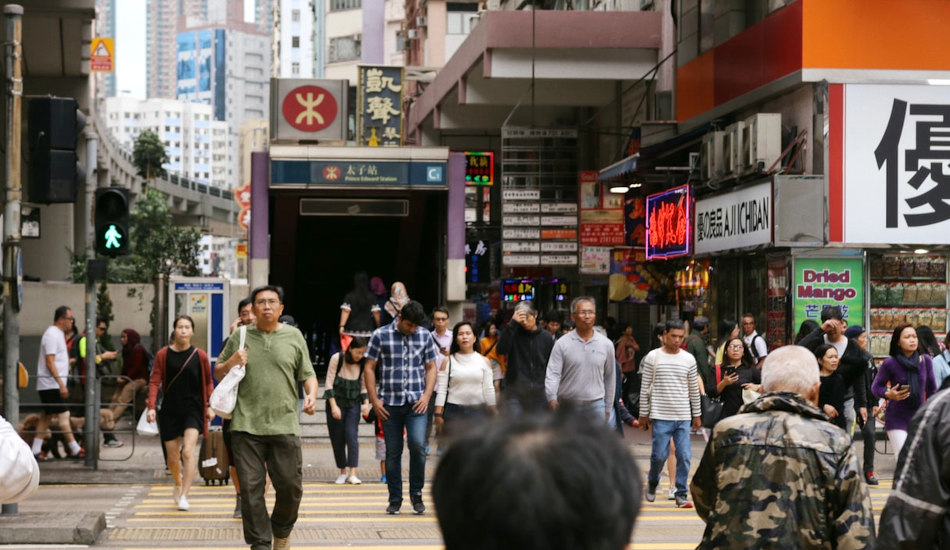 People crossing the street in Hong Kong.