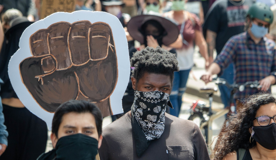 Thousands of "Black Lives Matter" protesters attend a rally during the pandemic.