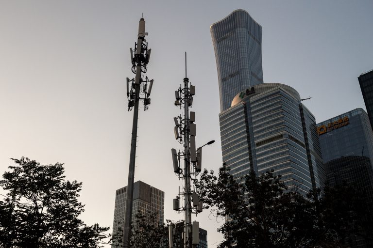 A cellular tower, used for a 5G network, is seen on a street in Beijing on September 2, 2020. (Image: NICOLAS ASFOURI/AFP via Getty Images)