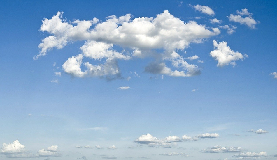 Blue sky with a few clouds.