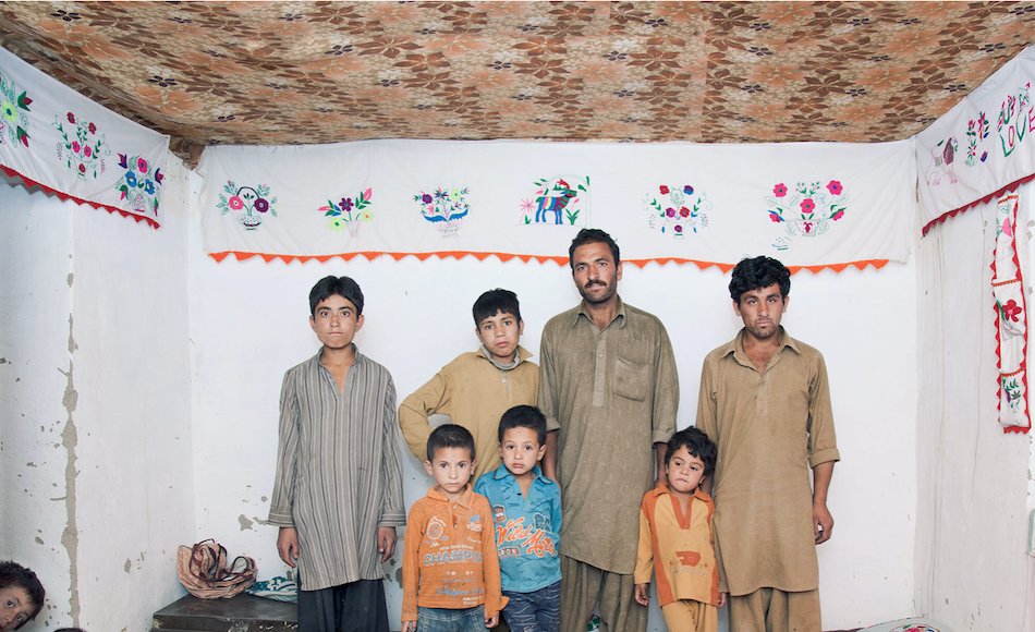 Miner Mohammed Ashraf with his eight sons in Dassu, Pakistan.