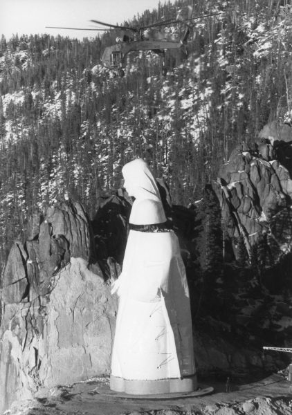 construction of lady of the rockies statue of virgin mary helicopter putting head on body