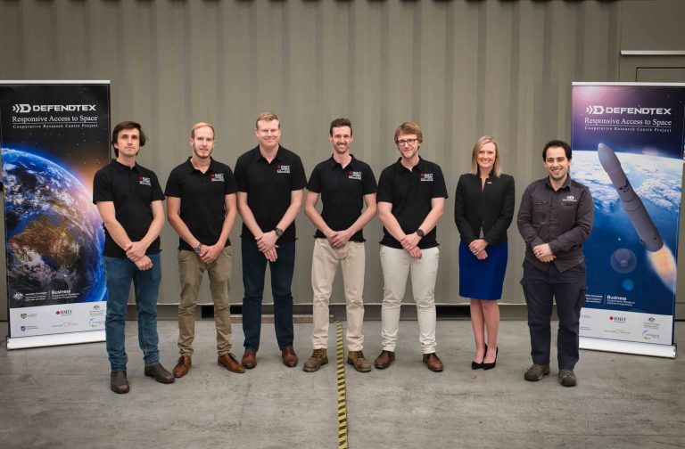 Part of the team: RMIT's Nicholas Mason-Smith, Maximilian Wenzel, Adrian Pudsey, Nathan Paull, and Quentin Michalski with DefendTex's Julia O’Callaghan and Lachlan Theobald, who is also an RMIT alumnus.