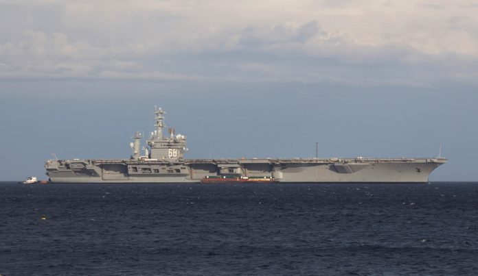 A Nimitz-class aircraft carrier at sea.