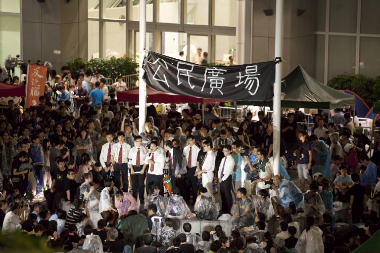 Students give a speech in front of the central party offices in Admiralty Hong Kong on September 6, 2012.