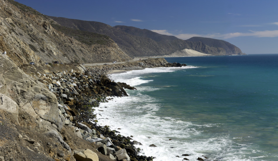 A section of California's Pacific Coast Highway winds its way along the ocean.
