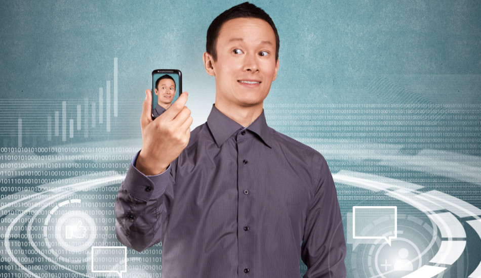 An Asian man makes a profile avatar photo using a smartphone.