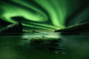 A brilliant green aurora.
