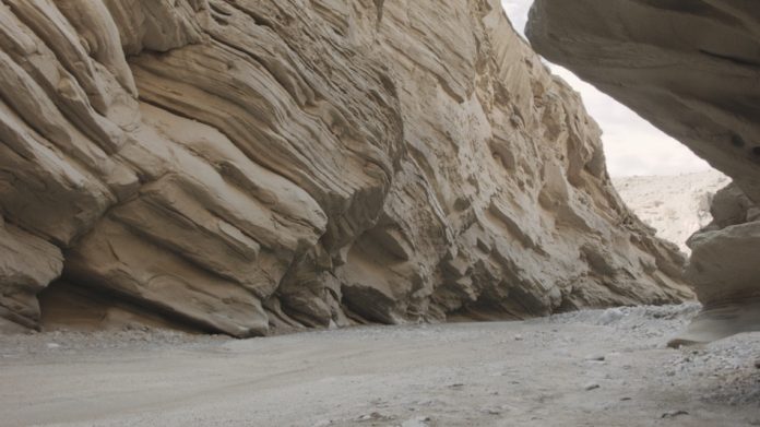 stratified rock wall