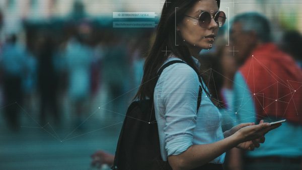 A woman's face being scanned by facial recognition technology.
