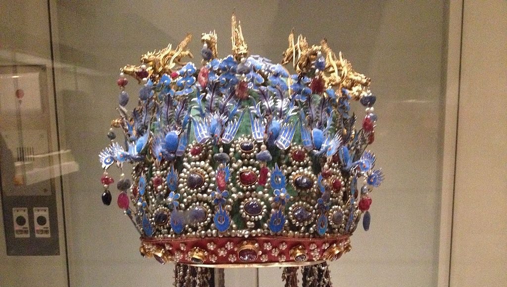 Elaborate Chinese headdress made from blue kingfisher feathers, gold, pearls, and other precious gems.