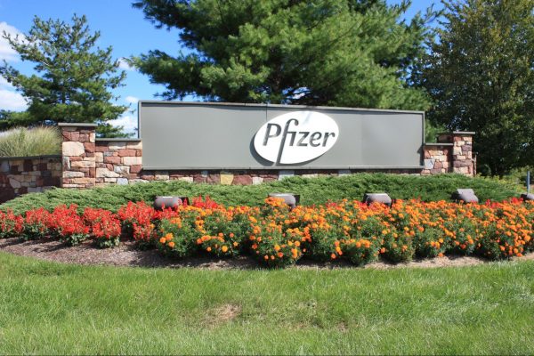 Pfizer Logo outside corporate office. Concerns around COVID-19 vaccine pregnancy abound.